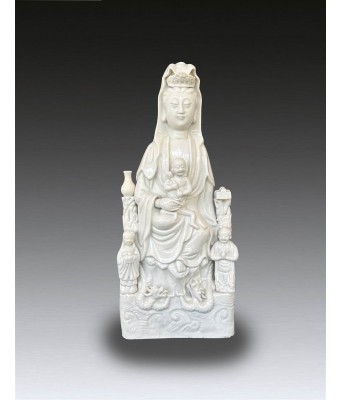 A Dehua Seated Guanyin and Attendents 17 Century early 18 Century